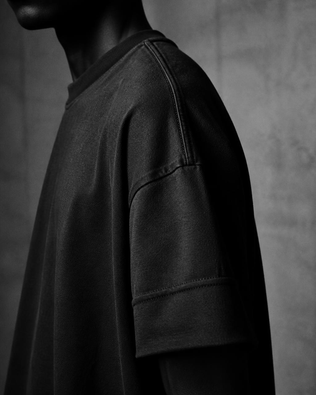 Close detail of a monochrome BORN UNRULED piece